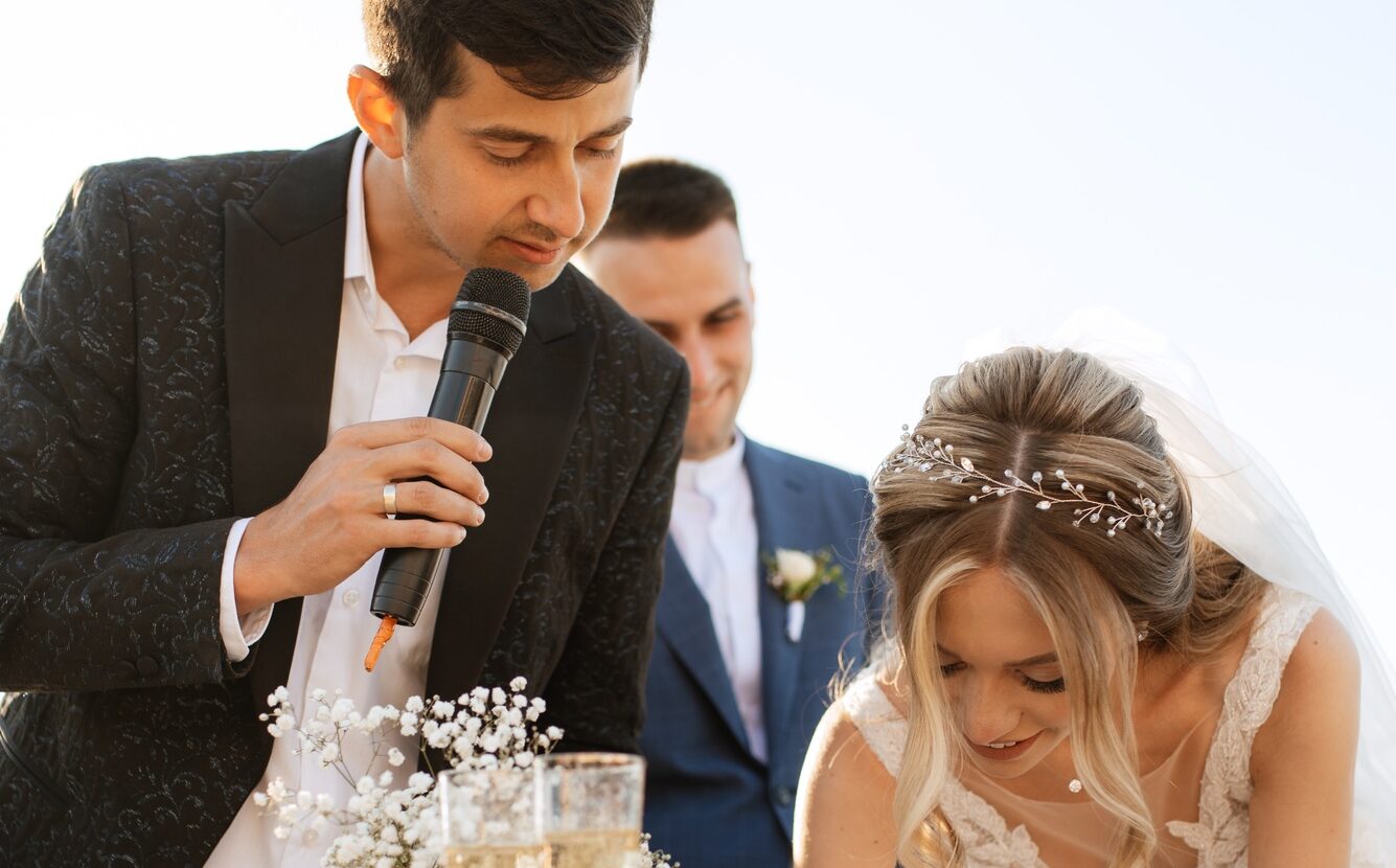 wedding ceremony of the newlyweds on the pier