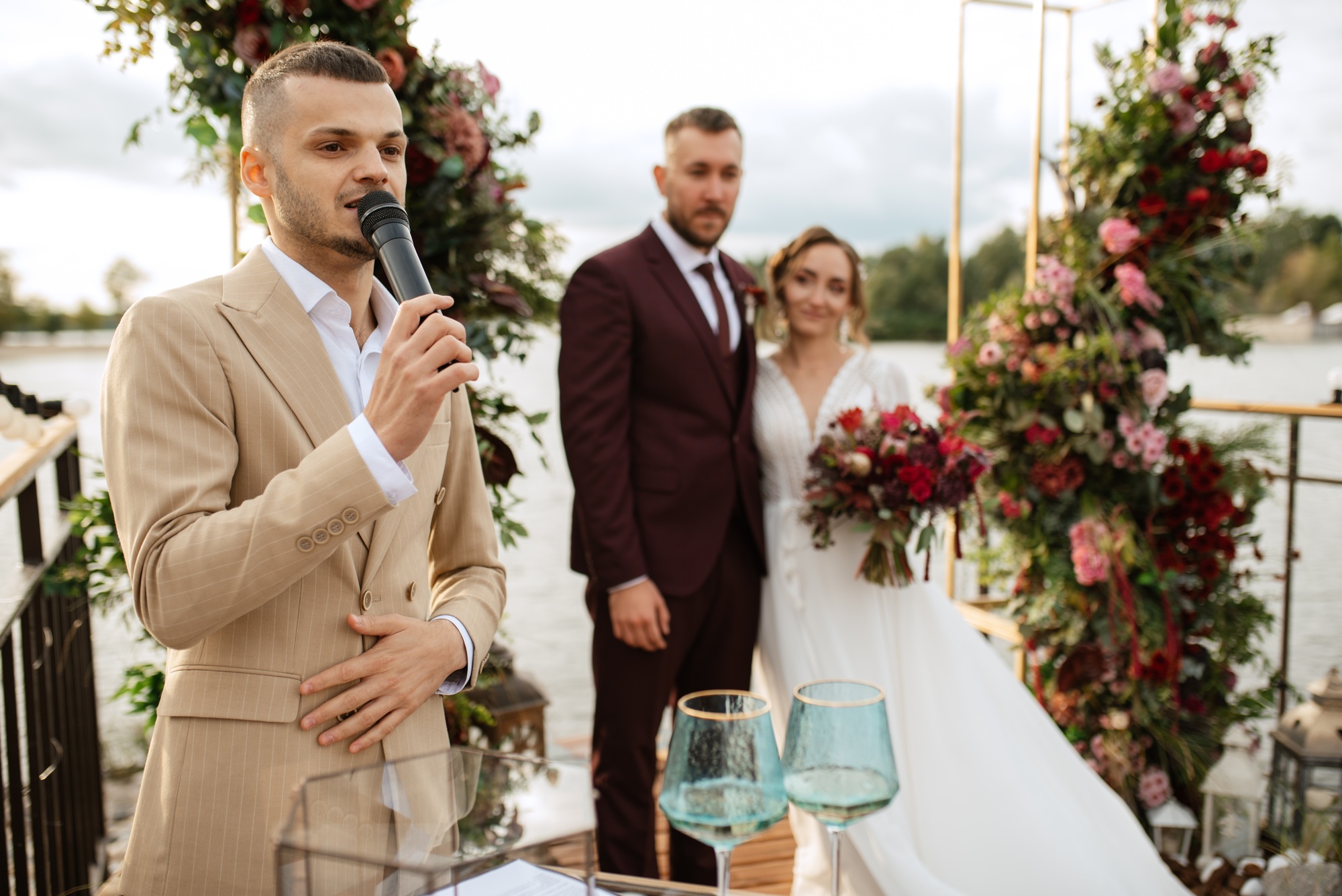wedding ceremony of the newlyweds on the pier